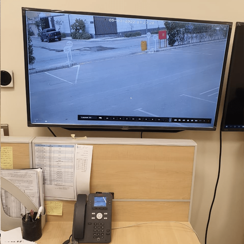 CCTV monitor showing parking area